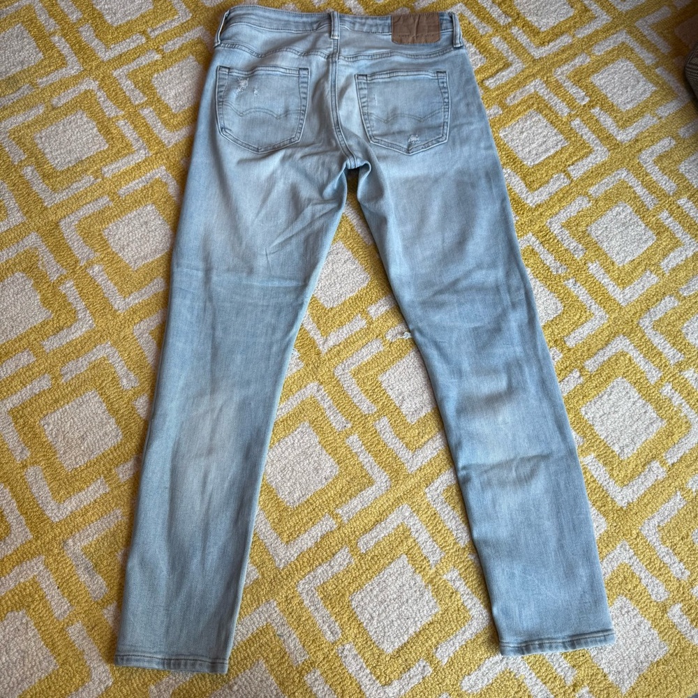 Stylish Black and Light Blue Distressed men’s Jeans - Picture 10 of 16